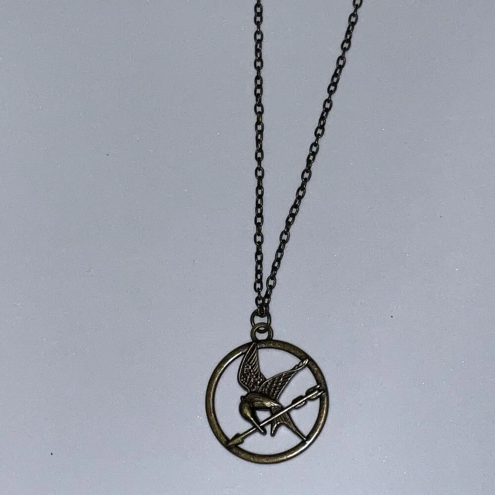 HUNGER GAMES Katniss Mockingjay Pendant Necklace Officially Licensed 2012 NEW